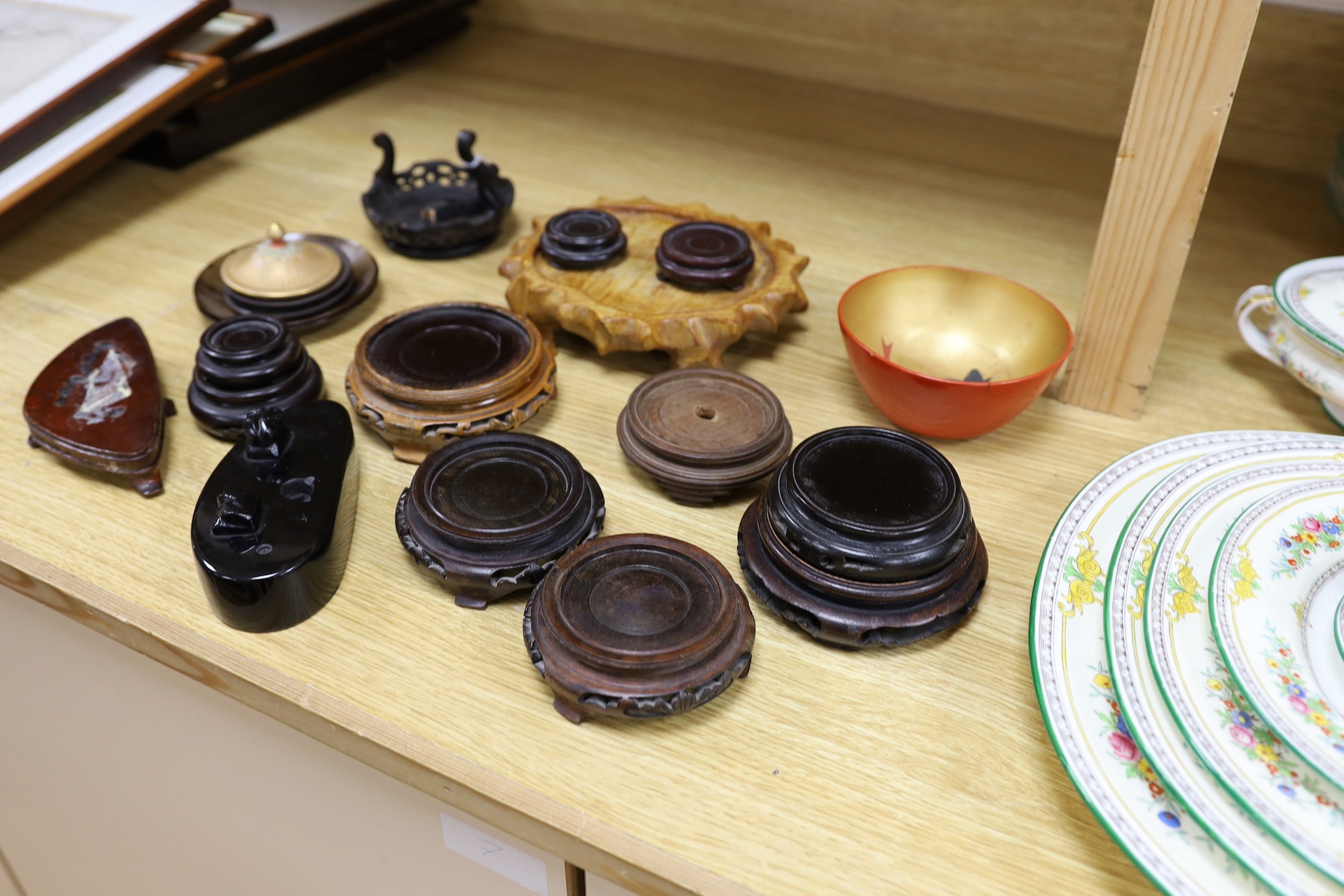 Assorted Chinese wooden stands and a lacquer bowl